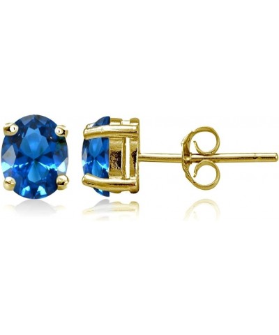 Yellow Gold Flashed Sterling Silver Simulated Gemstone 7x5mm Oval Stud Earrings Simulated London Blue Topaz $10.07 Earrings